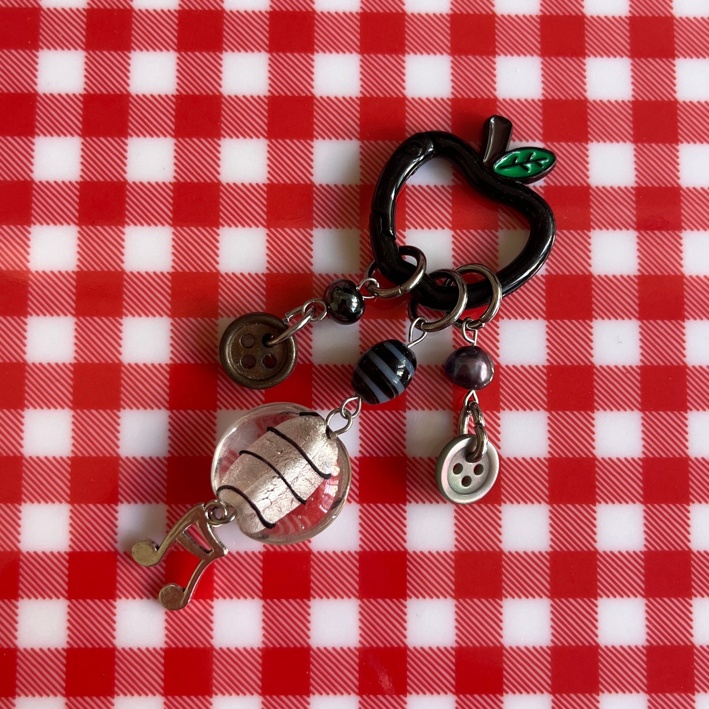 black apple keychain