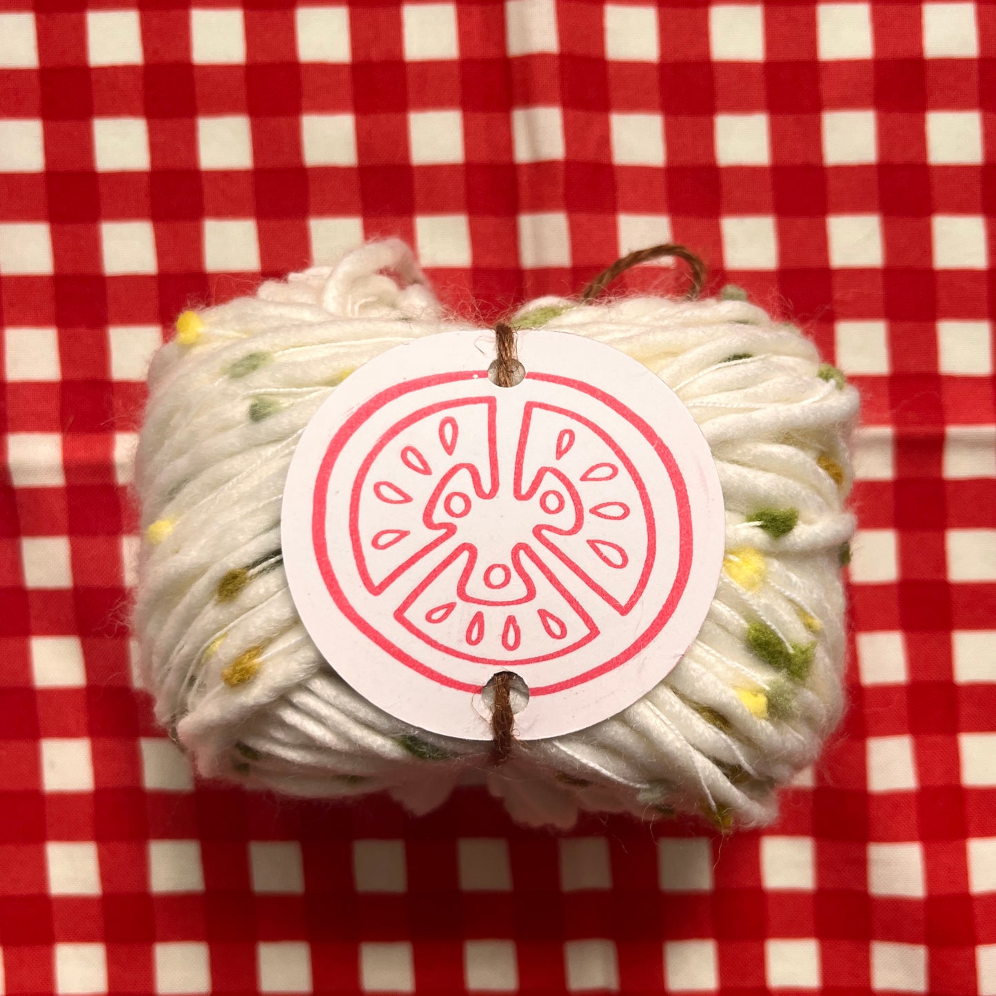 yarn #004: green pompom [white]