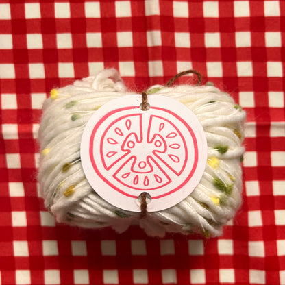 yarn #004: green pompom [white]