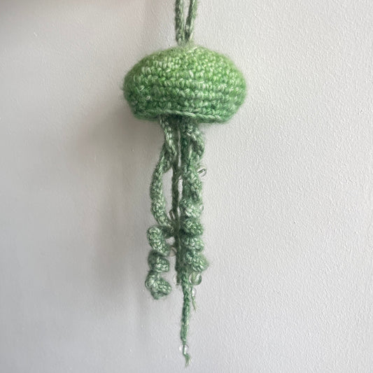 green jellyfish with beads