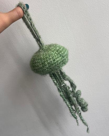 green jellyfish with beads